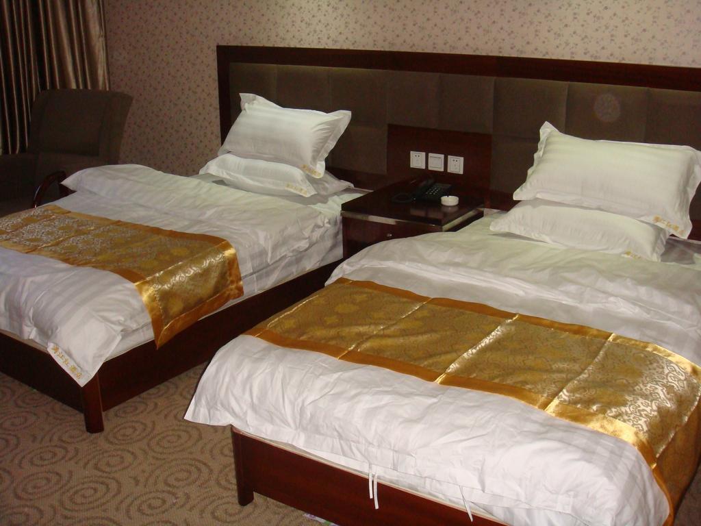 Jiuzhaigou Man Jiang Hong Hotel Chambre photo