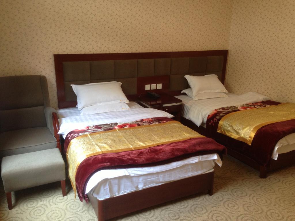 Jiuzhaigou Man Jiang Hong Hotel Chambre photo