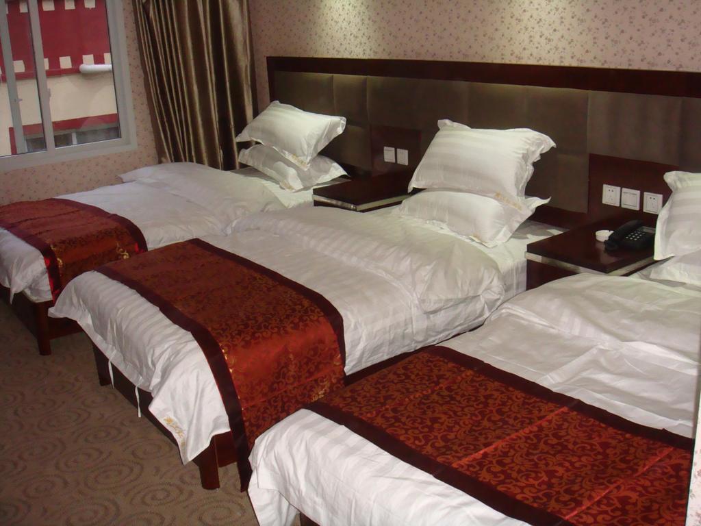 Jiuzhaigou Man Jiang Hong Hotel Chambre photo